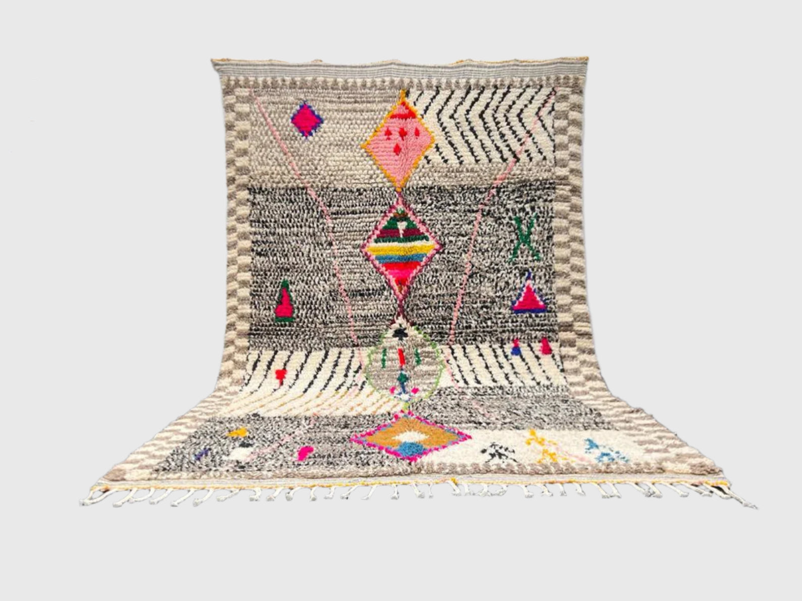 Handmade Moroccan wool rug with colorful Berber symbols on a neutral tribal pattern