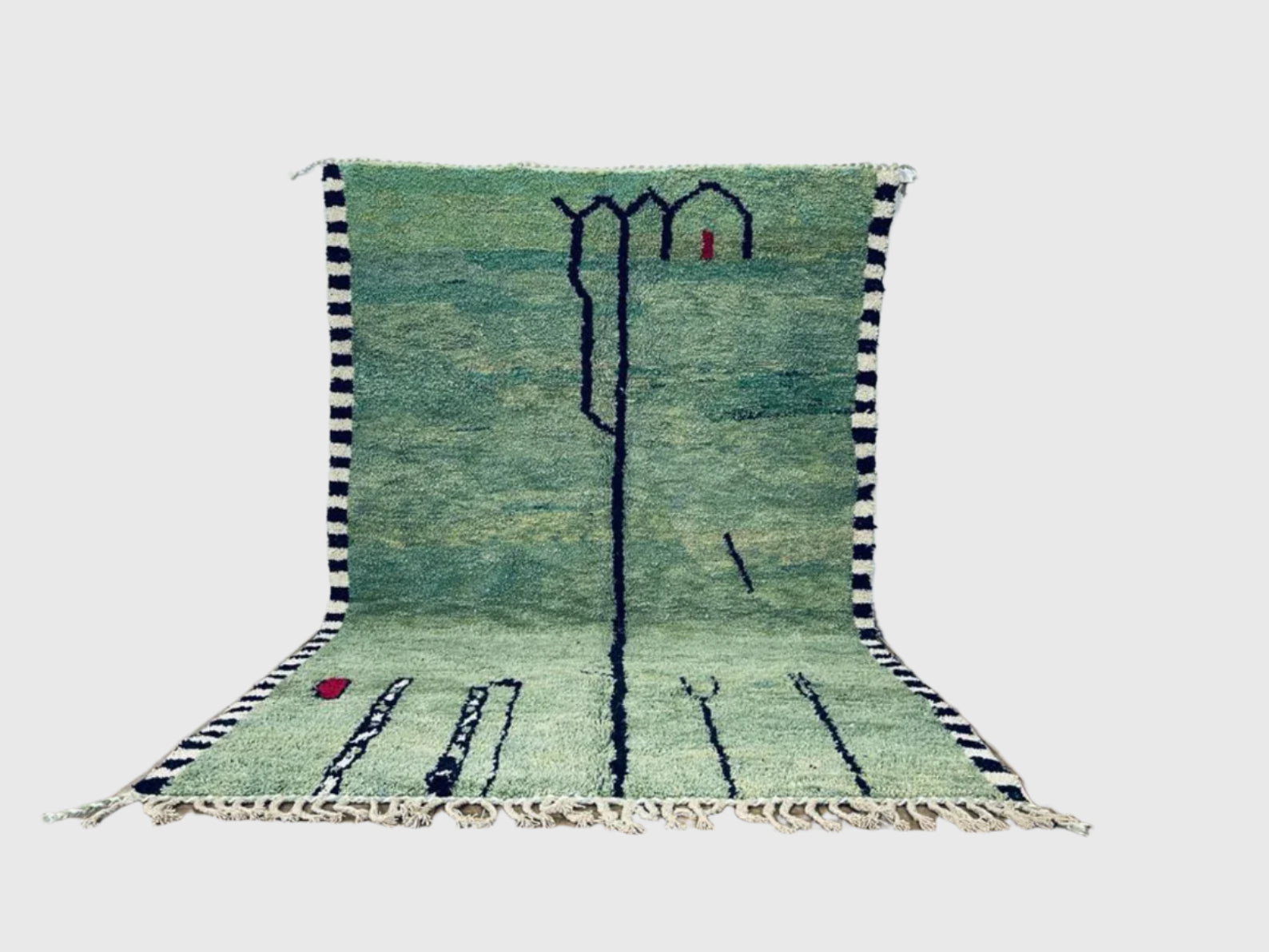 Handmade green Moroccan wool rug with minimalist tree motif and striped borders