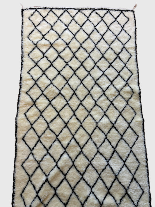 Handmade Beni Ourain Moroccan rug in cream wool with black diamond pattern, 6x9 feet