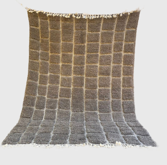 Handmade Moroccan rug featuring a subtle grey checkered pattern. Ideal for modern living rooms, bedrooms, or minimalist spaces.