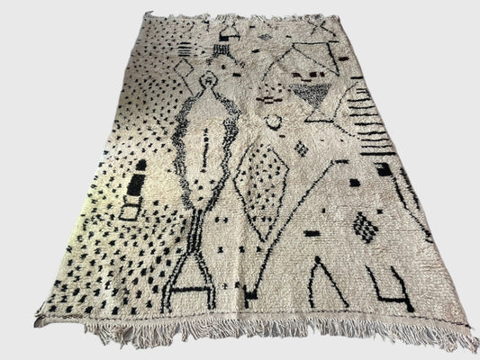 Handmade Moroccan wool rug in black and white with abstract tribal patterns, 6x9 feet