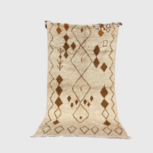 Handmade Moroccan Berber wool rug in beige with warm brown diamond and tribal motifs, 5x8 feet