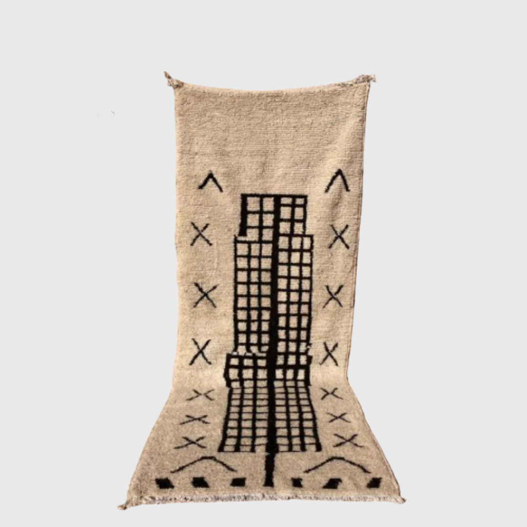 Handmade Moroccan wool rug in beige with modern black grid and abstract tribal symbols, 5x8 feet