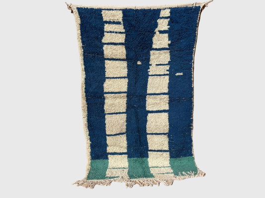Handmade Moroccan modern wool rug featuring bold vertical stripes in deep blue, white, and green, 5x8 feet