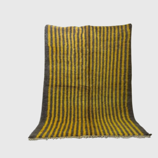 Handmade Moroccan wool rug with bold vertical yellow and black stripes, modern design, 5x8 feet