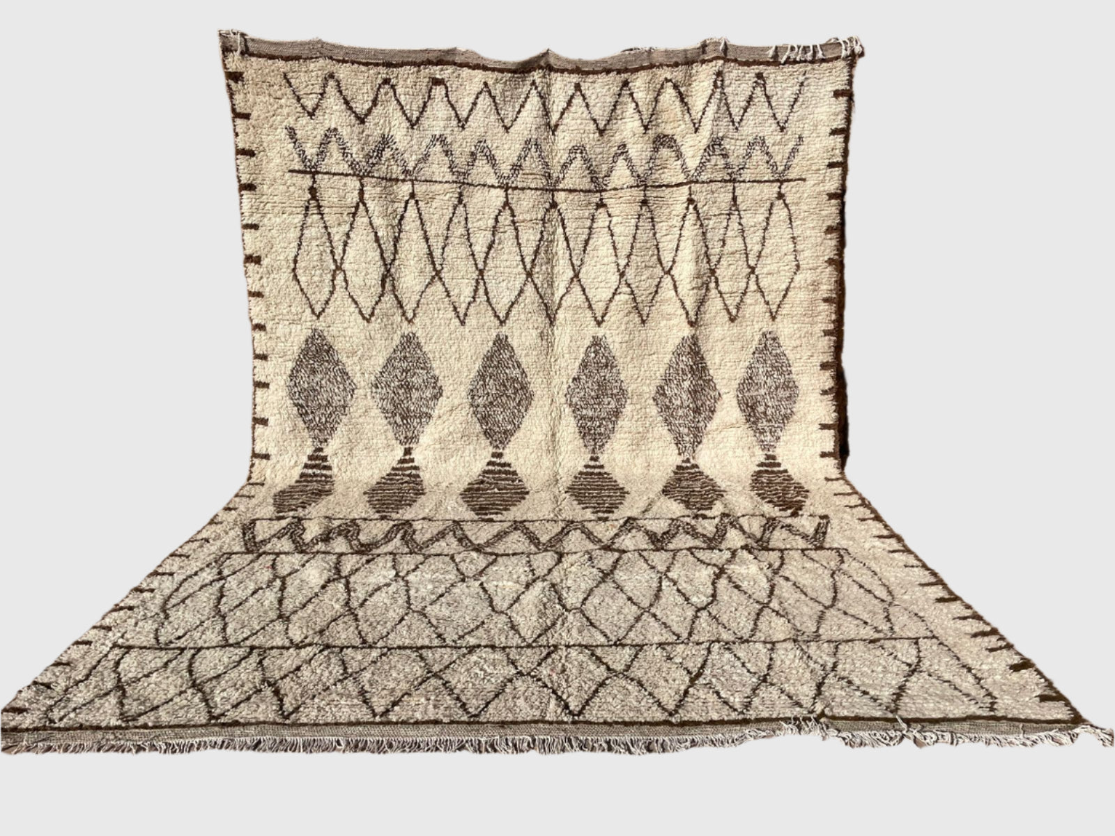 Handmade Moroccan wool rug with brown geometric diamonds and tribal design