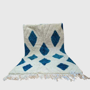 Handmade Moroccan wool rug in cream and blue with Berber diamond pattern, 5x8 feet