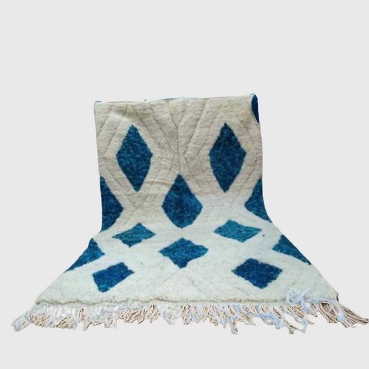 Handmade Moroccan wool rug in cream and blue with Berber diamond pattern, 5x8 feet